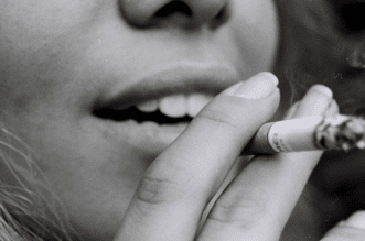 How Does Smoking Affect Your Dental Health: Causes and Treatment?